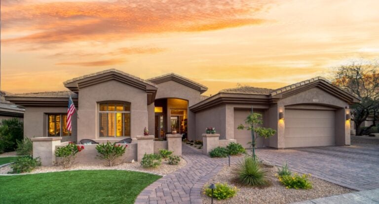 Home at sunset showing how seasonal solar heat gain affects window performance