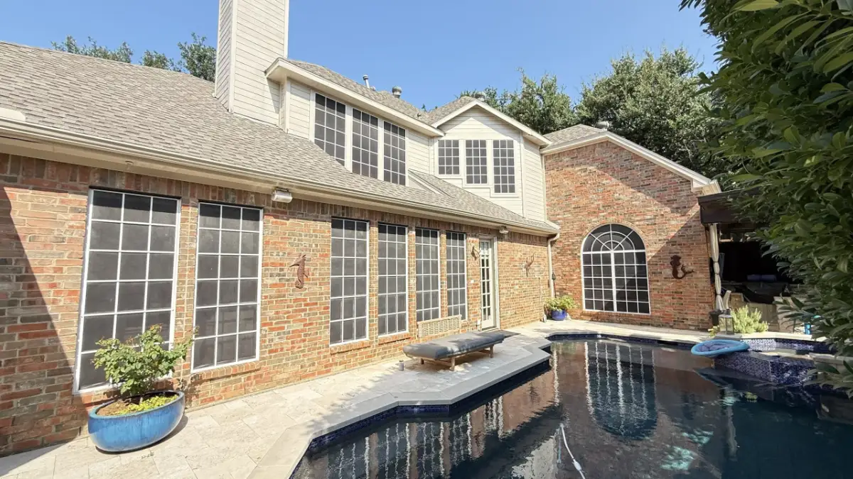 Before: original windows on a brick home, before replacement by Optimal Windows